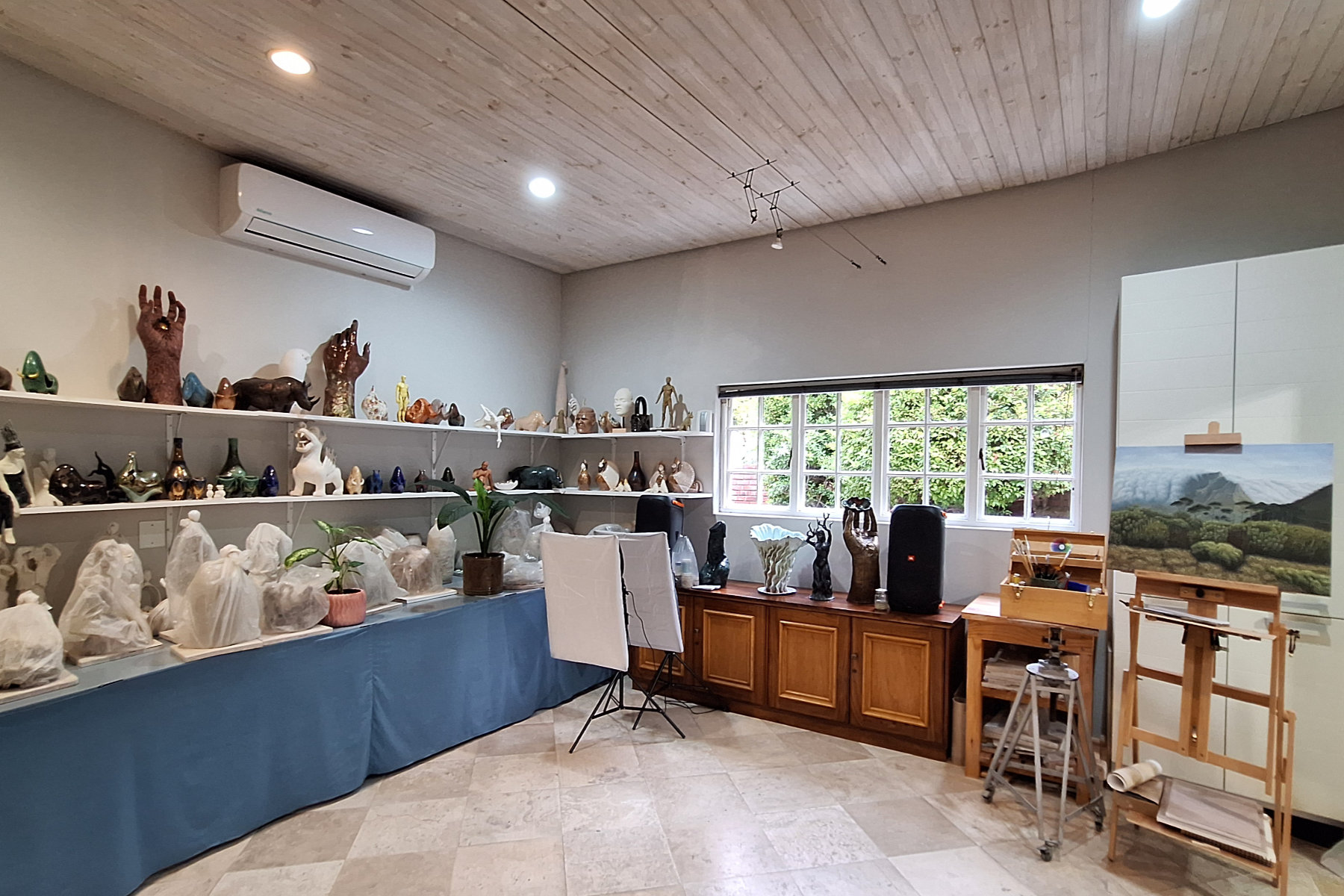 Studio storage, wedging and painting area