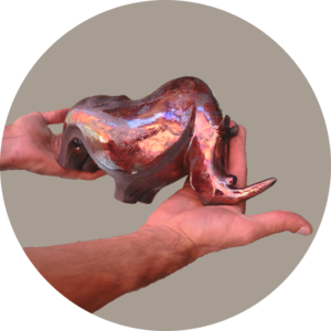 Ceramic Adult Rhino immediately after a Raku fire by Alan Nabavi