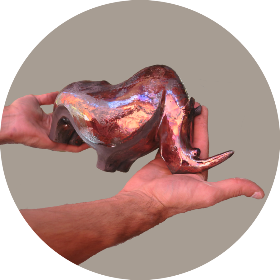 Ceramic Adult Rhino immediately after a Raku fire by Alan Nabavi